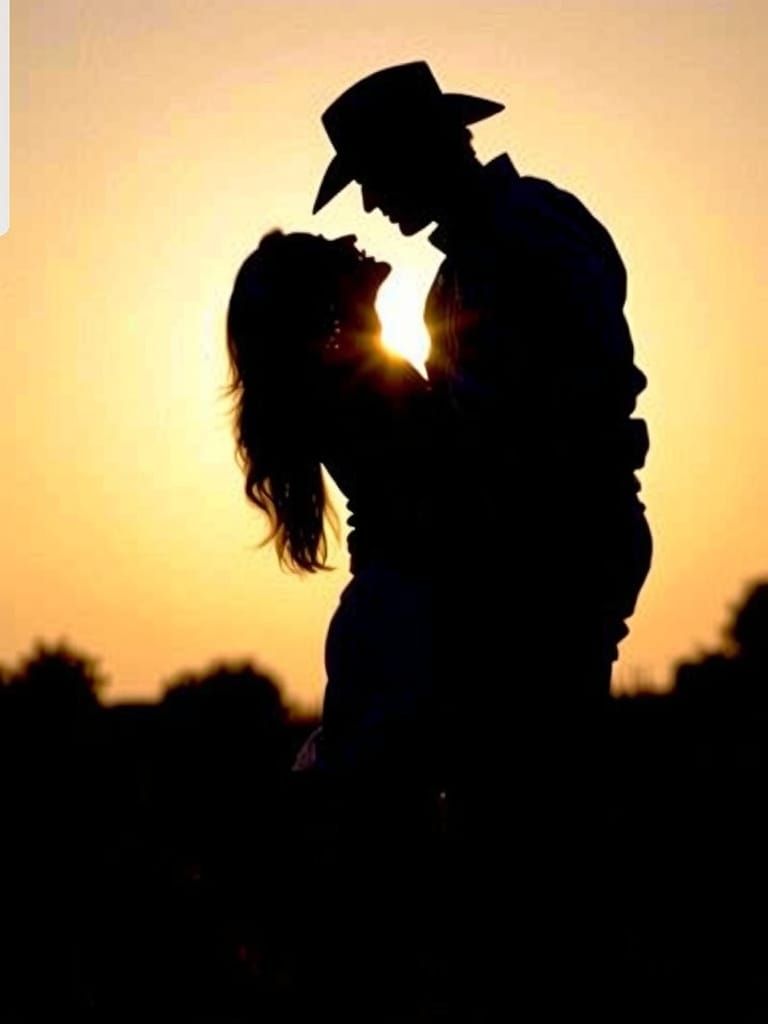 Cowboy and Cowgirl's Sunset Kiss Portrait