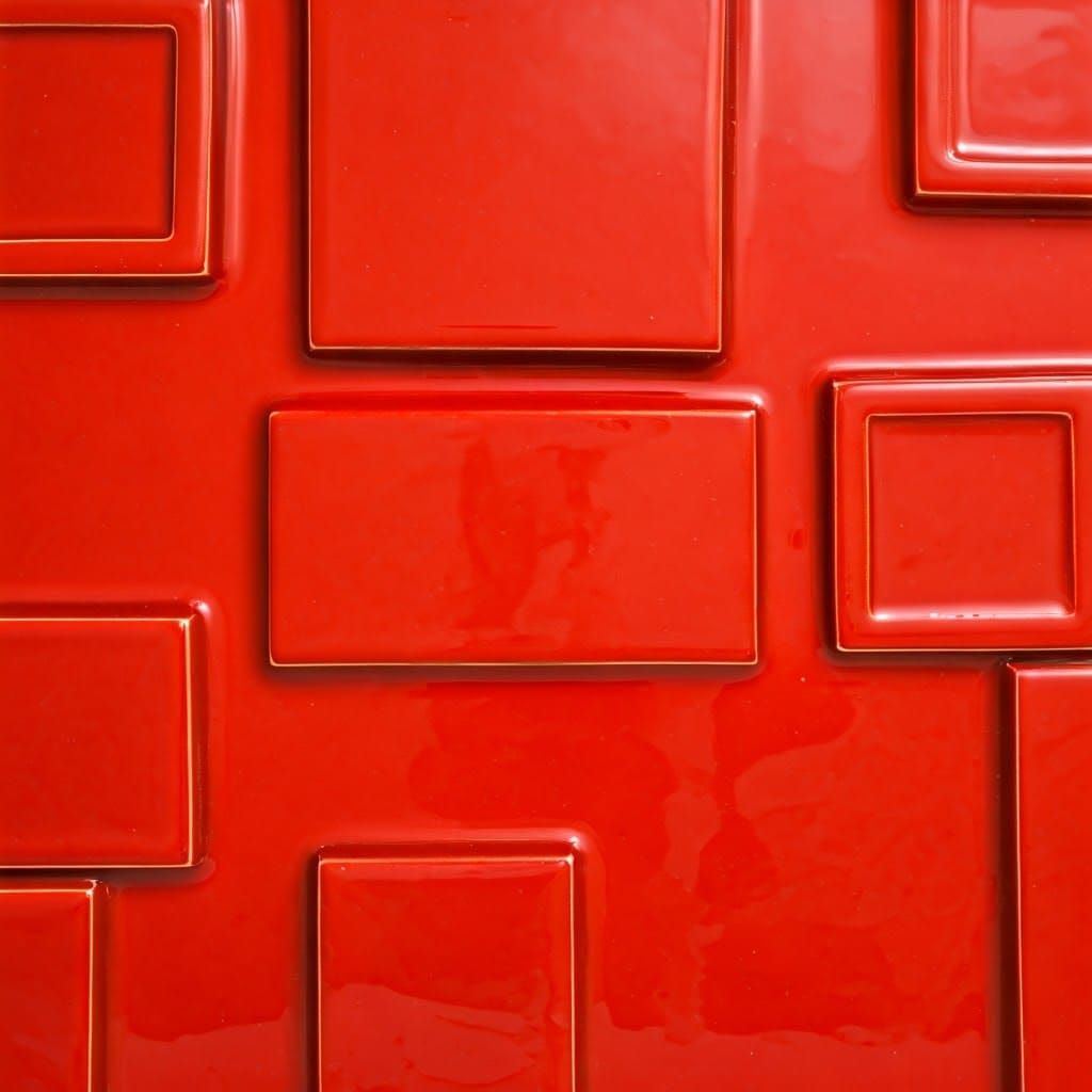 Vibrant Geometric Abstraction in Red Glazed Ceramic