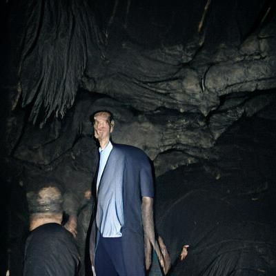Tall Man in a Dark Cave