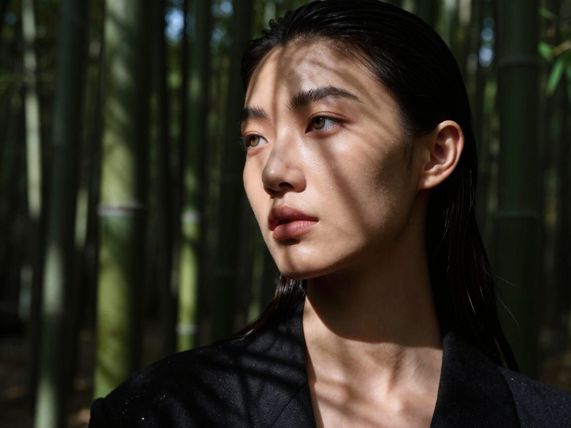 Fashion Model in Striped Bamboo Forest Shadows