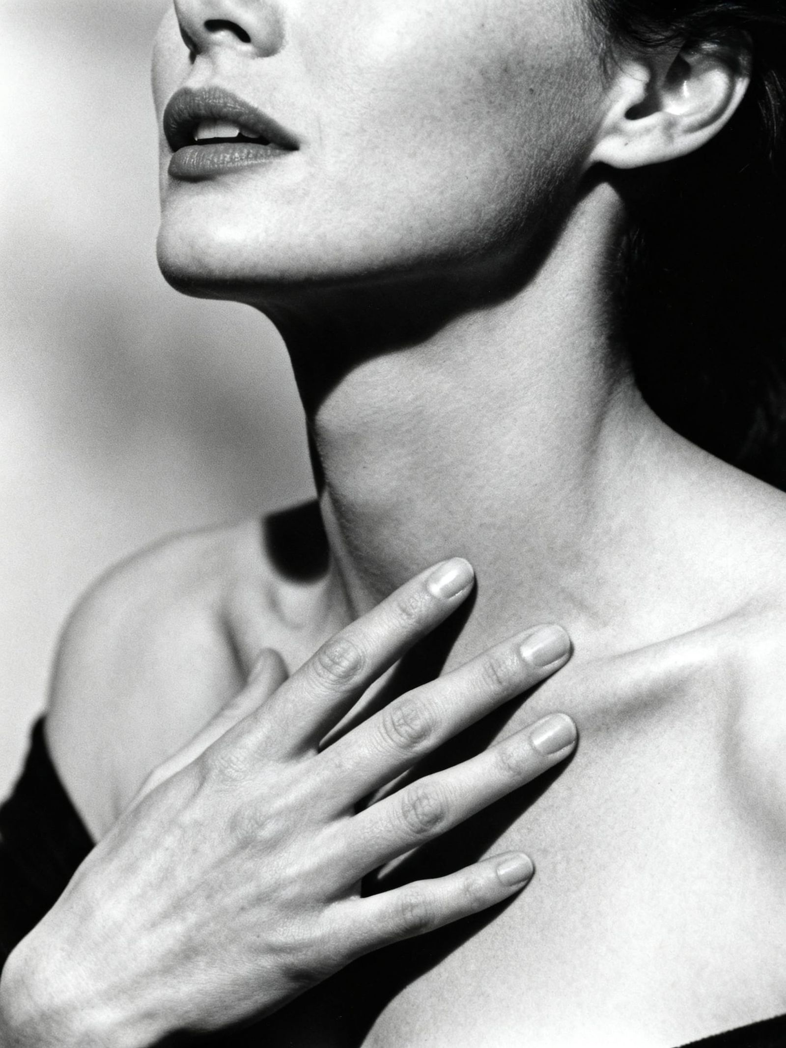 Woman's Profile in Dramatic Black and White Light