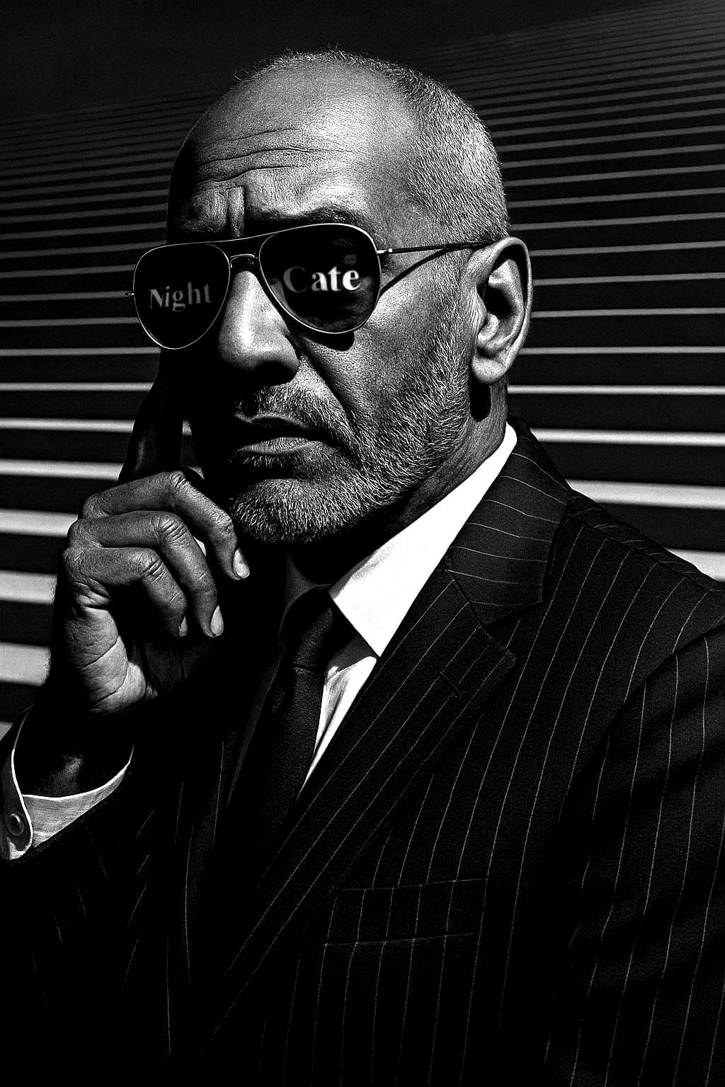 Monochrome Portrait of Man in Pinstripe Suit