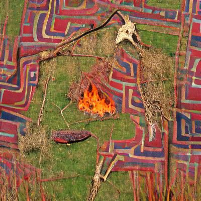 Antique Rug and Wishbone Under Burning Tree