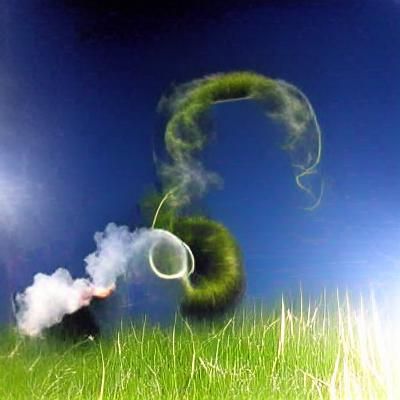 Smoke Rings in a Grassy Field
