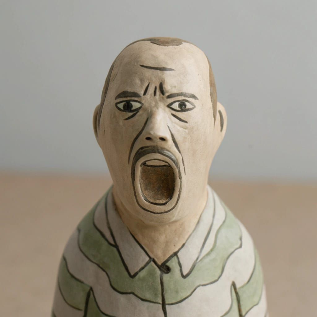 Charcoal Drawing of a Screaming Man