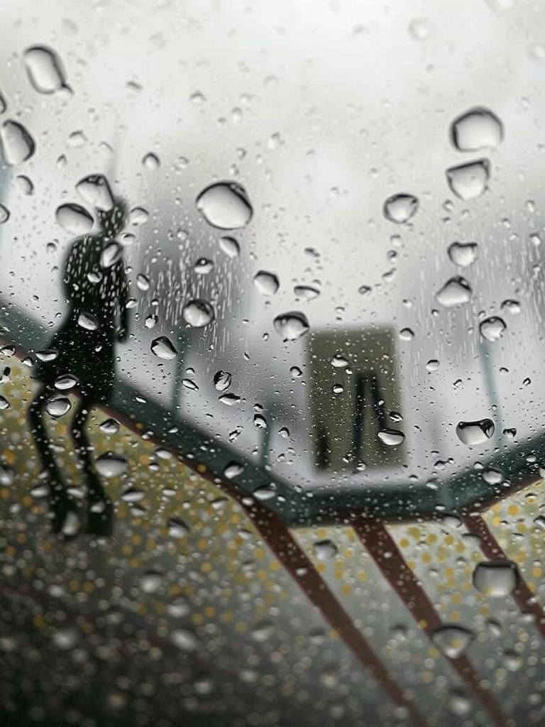 Rain and sadness on the city.