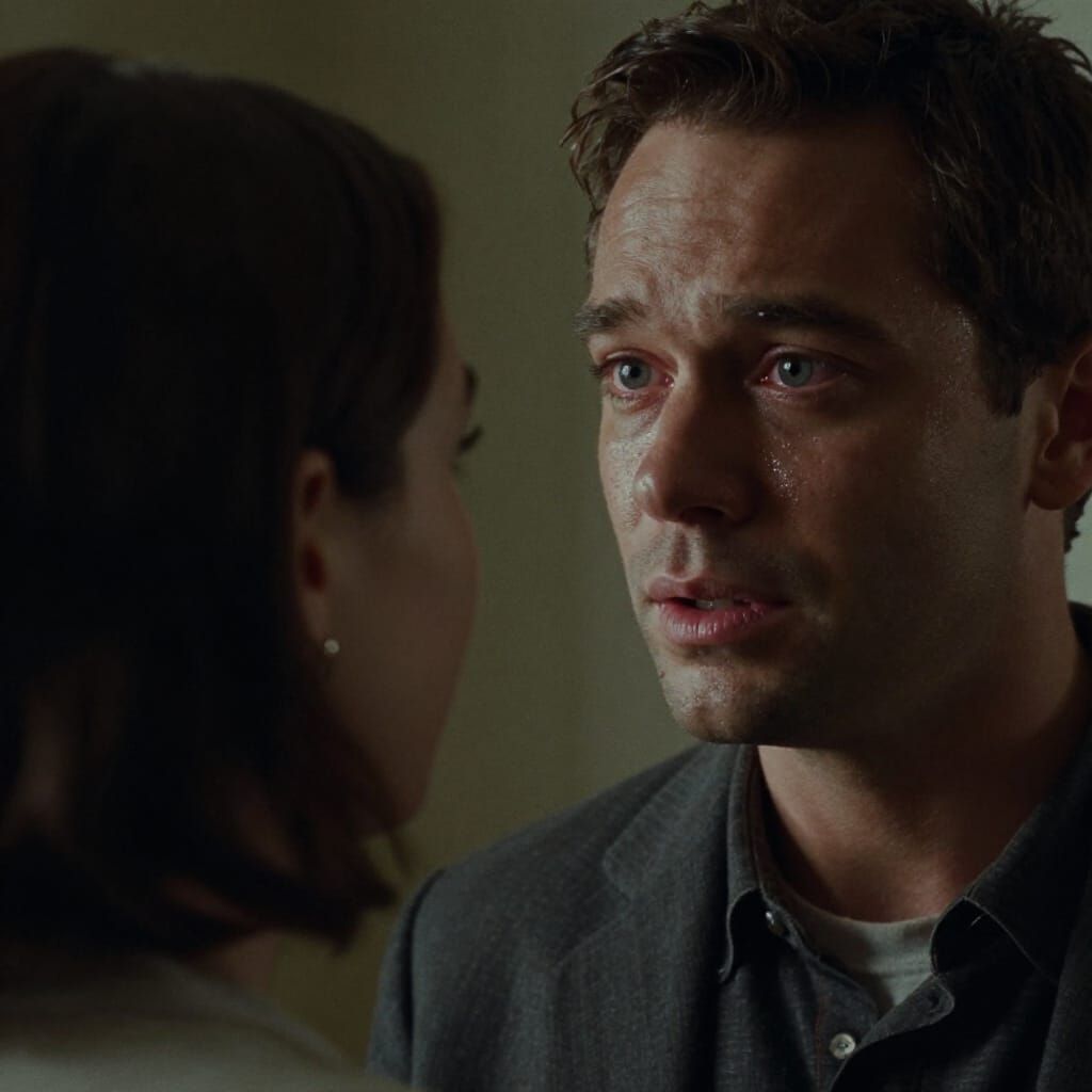 Man's Glistening Eyes Convey Deep Emotion in Cinematic Film ...