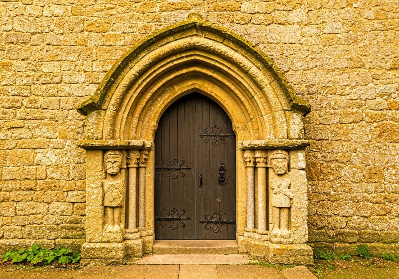 Medieval Norman Church with Romanesque Doorway and Weathered...