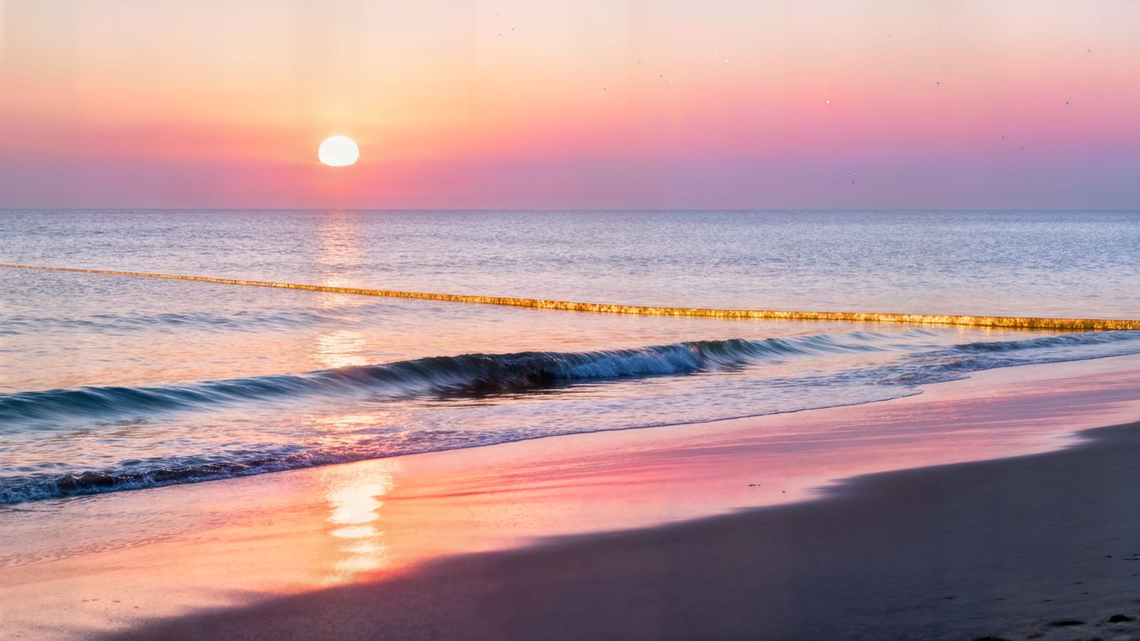 Serene Sunset Over Seashore in Pastel Tones