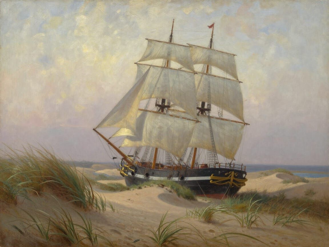 Stranded Sailing Ship on Sand Dunes in Soft Morning Light