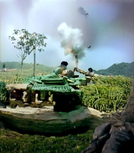 large army of chinese  tank firing at vietnamese troop
