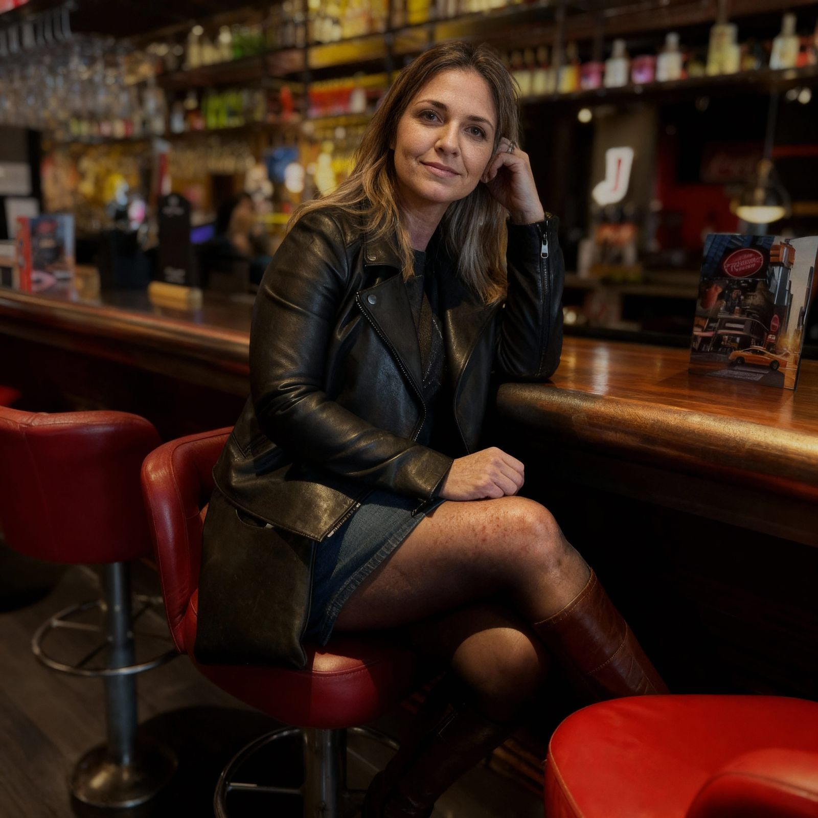 Woman in Leather Jacket at Bar, Photorealistic Style