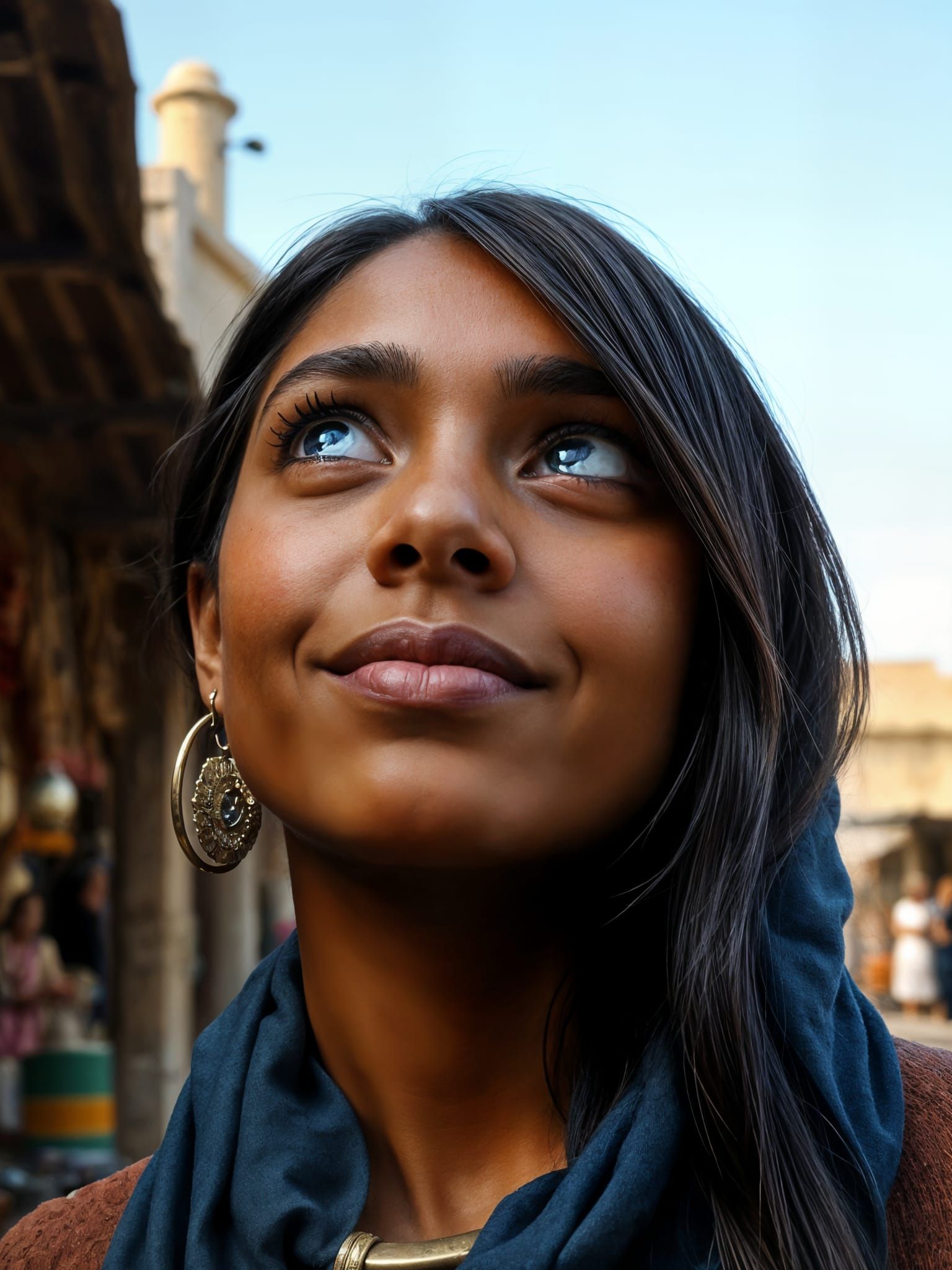 Gorgeous Young Girl with Blue Eyes and Dark Skin
