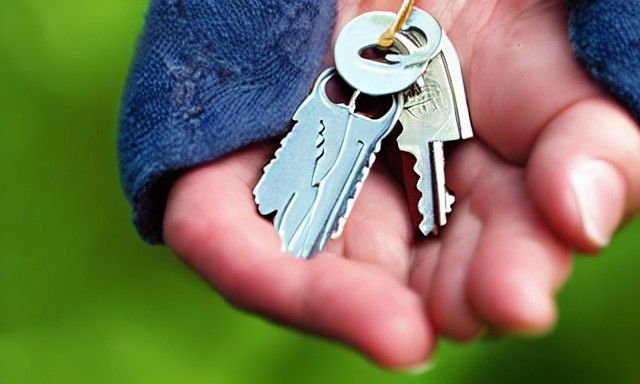 Angel Holding Keys to Happiness
