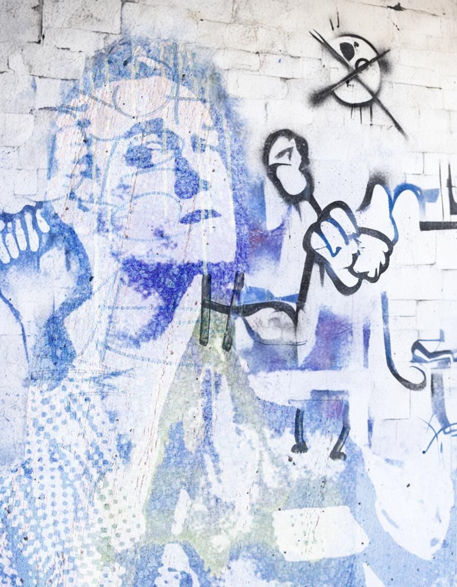 Graffiti Street-Art Figure on Concrete Wall