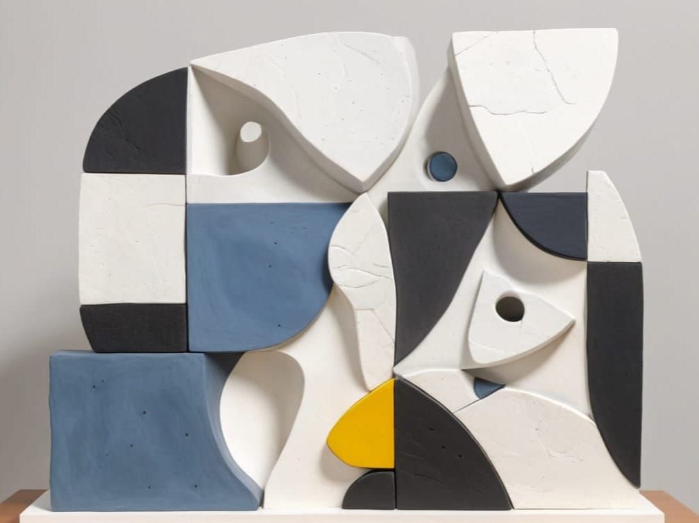 Eccentric Abstract Sculpture with Coral and Yellow Accents