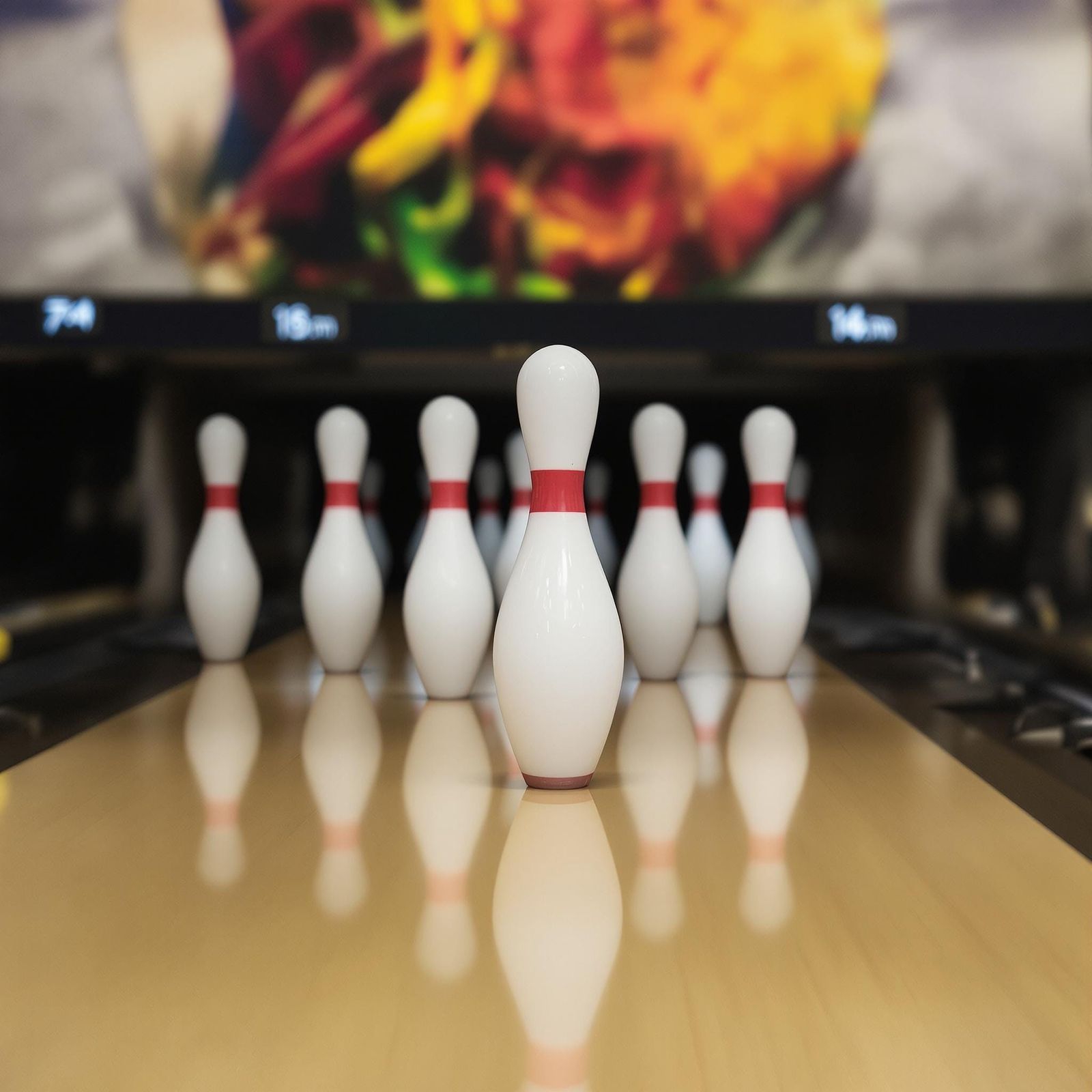 Vintage Bowling Alley Scene with White Pins