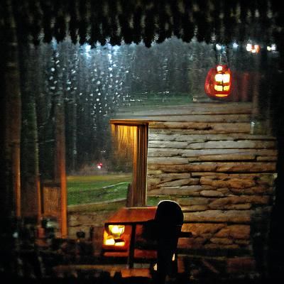 Rainy Night Cabin Porch View