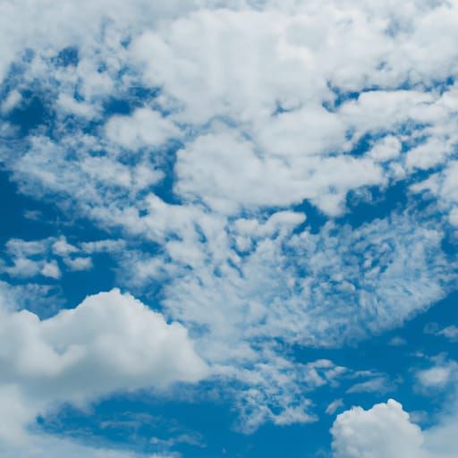 Blue Sky with White Fluffy Clouds Image