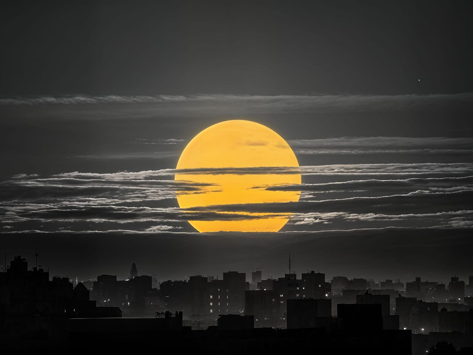 Yellow Sun Bursts Through Monochromatic Horizon