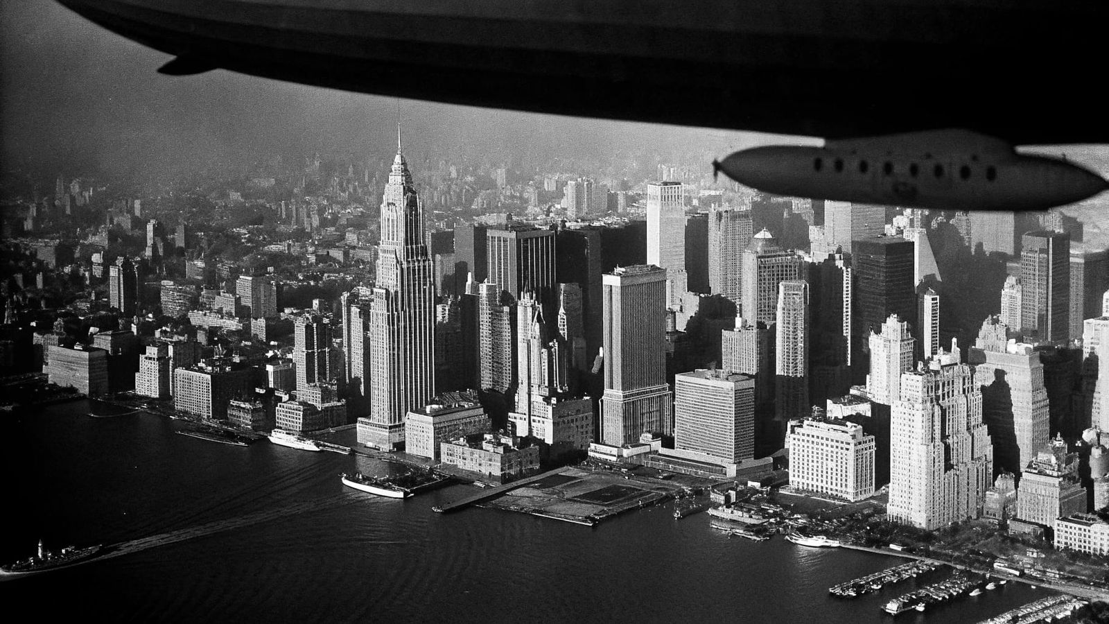 Early 20th Century Cityscape with Airship