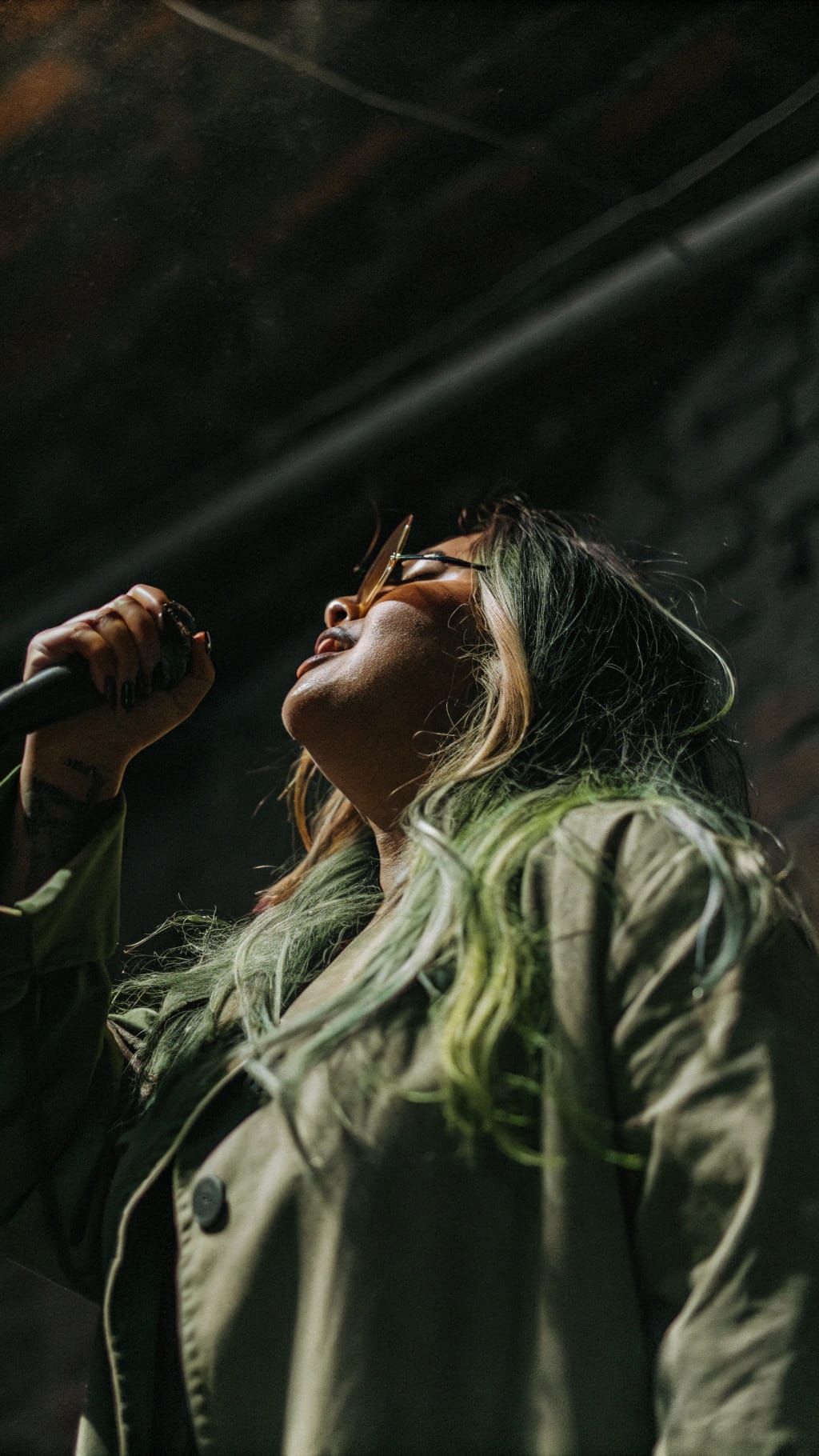 Mysterious Artist Lady Under Enchanting Stage Lighting