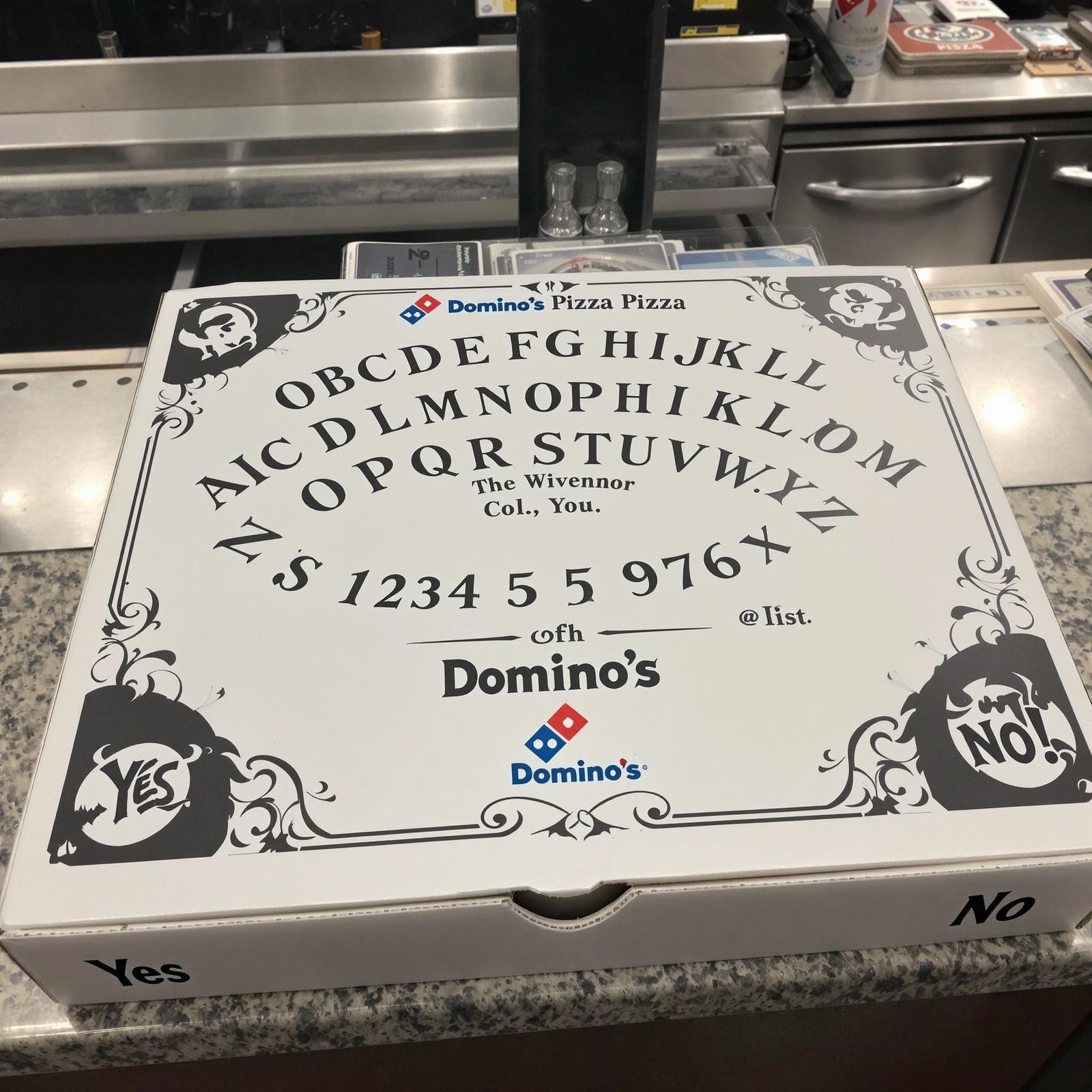 Domino's Ouija Board Pizza Box in a Modern Setting