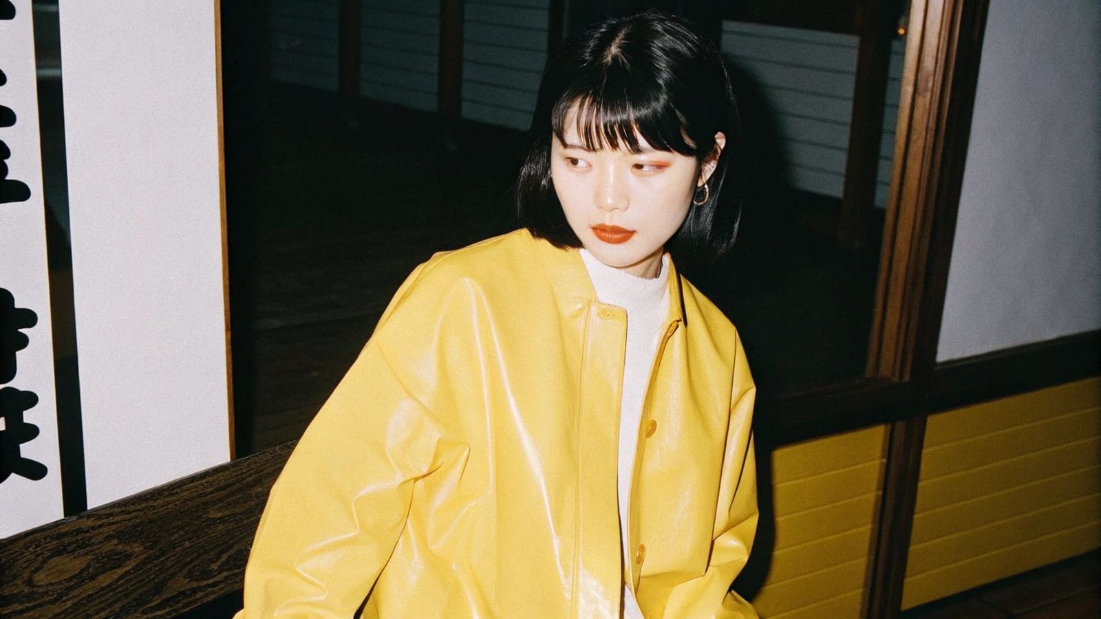 Neon-lit Portrait of a Young Woman in Tokyo