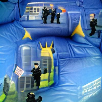 Police State Themed Bouncy Castle: AI Concept