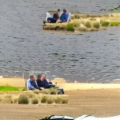 Three Men Relaxing in Casual Setting