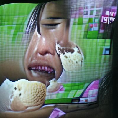 Sad Girl Eating Ice Cream Watching TV