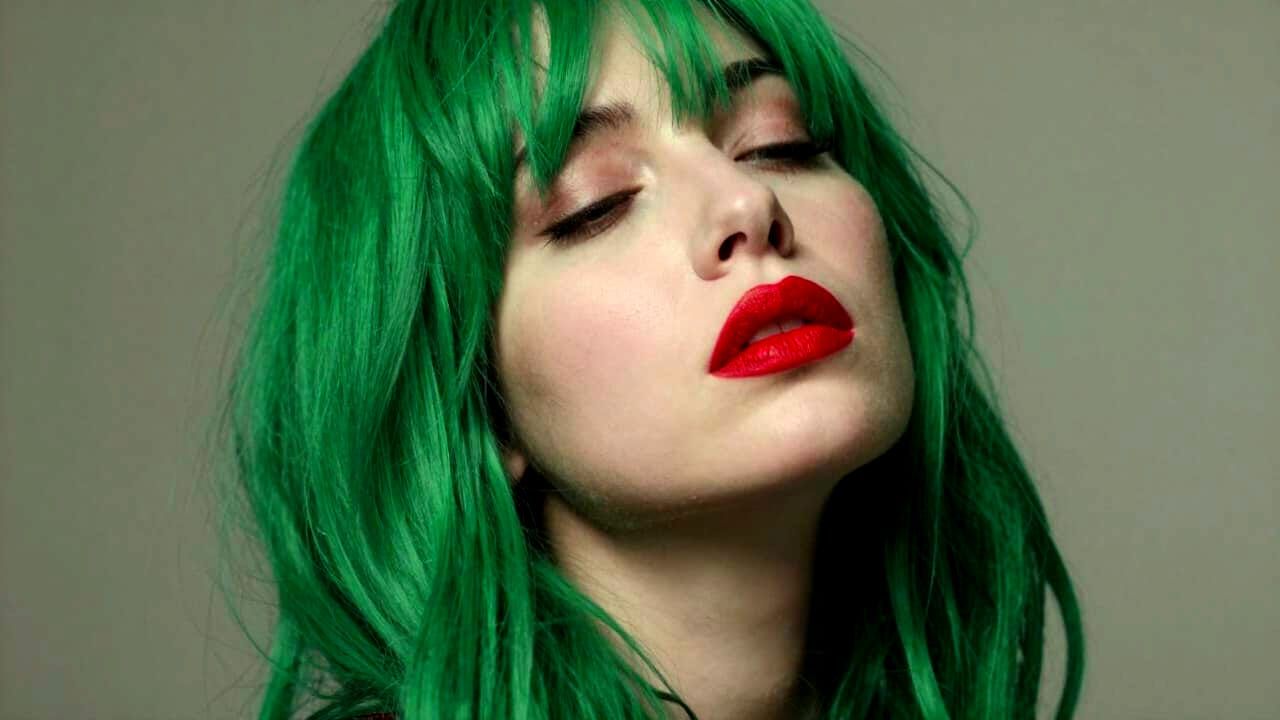 Melancholic Portrait of Woman with Green Hair and Red Lips