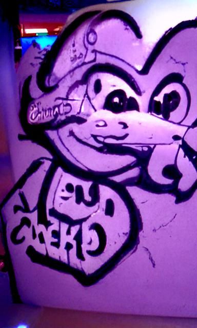 Chuck e cheese graffiti at a bar