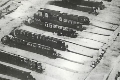 Vintage Trains Lined Up at 1940s Station