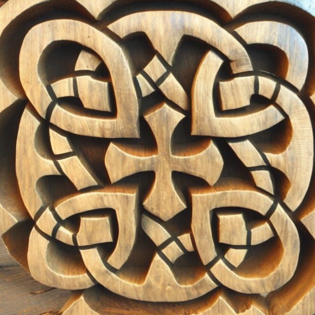 Celtic Knotwork Carved on Ancient Wooden Urns