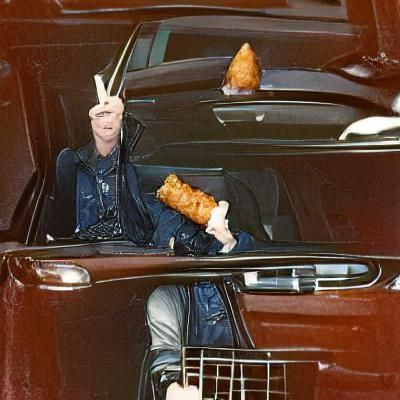 David Bowie Enjoys an Eggroll