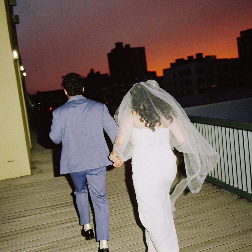 Bride and Groom Run into Sunset in Retro 35mm Film Style