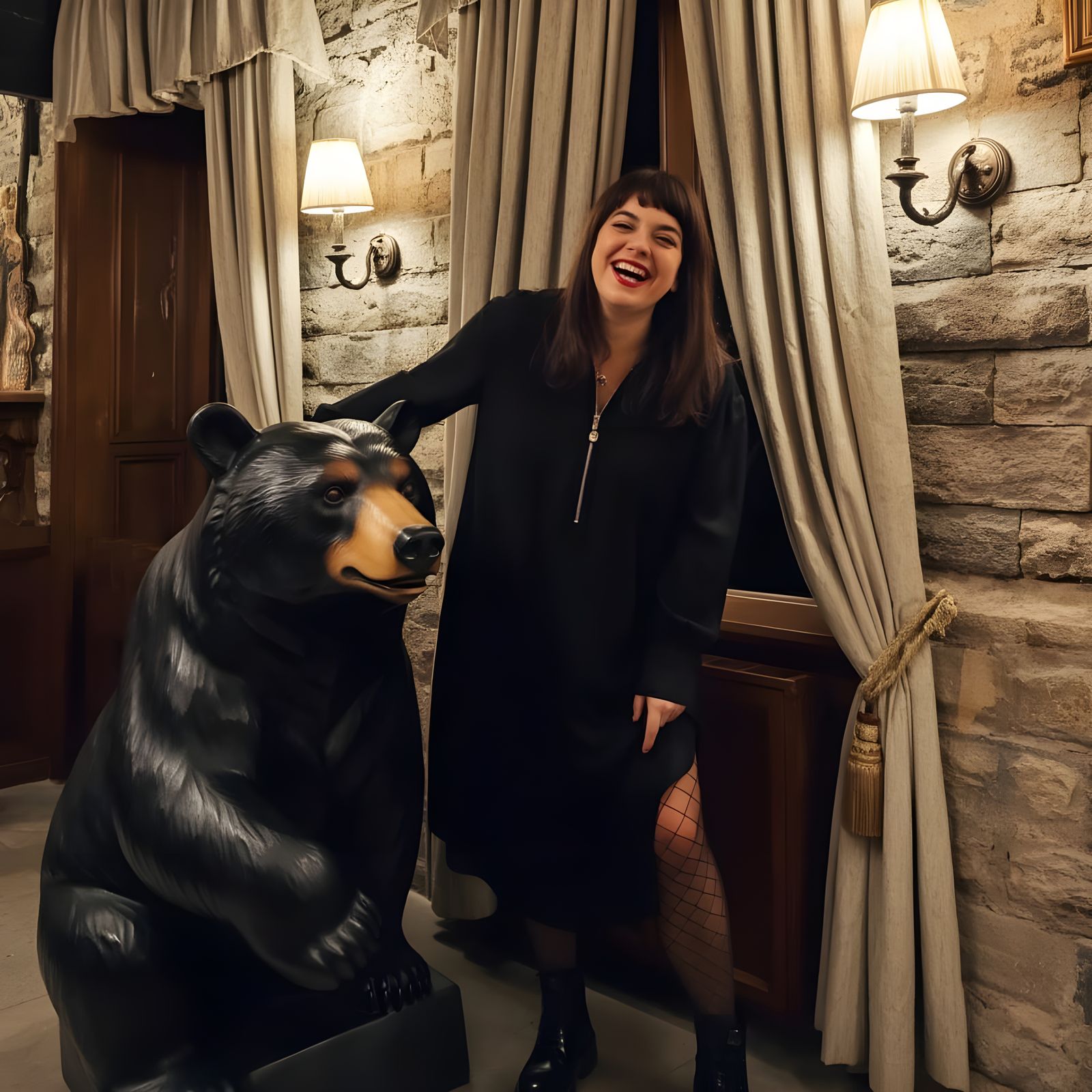 Young Woman Poses with a Friendly Black Bear Statue in a Sta...
