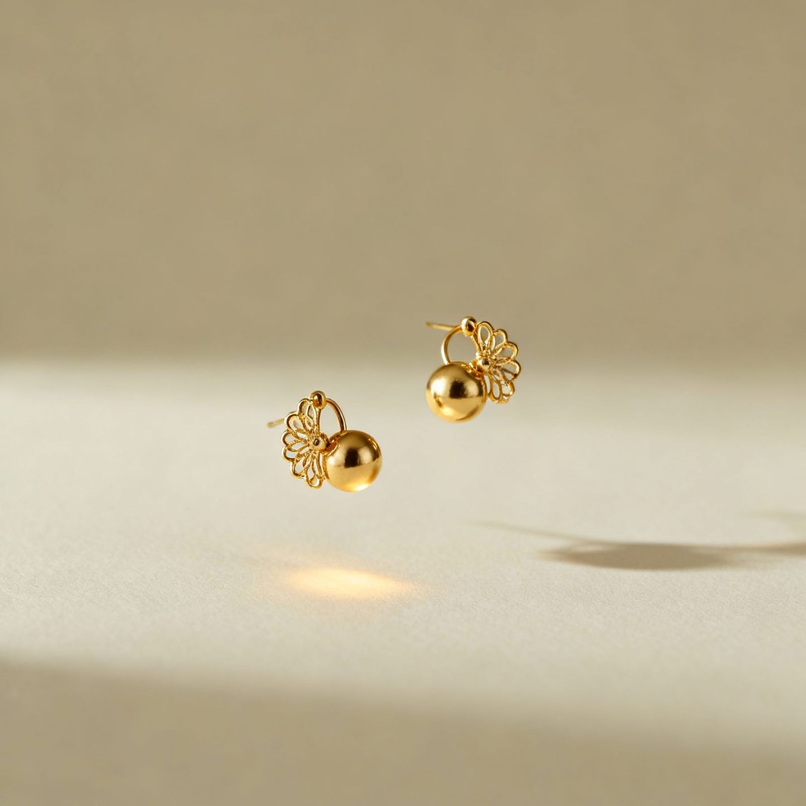 Elegant Gold Earrings with Gentle Glow in Minimalist Style