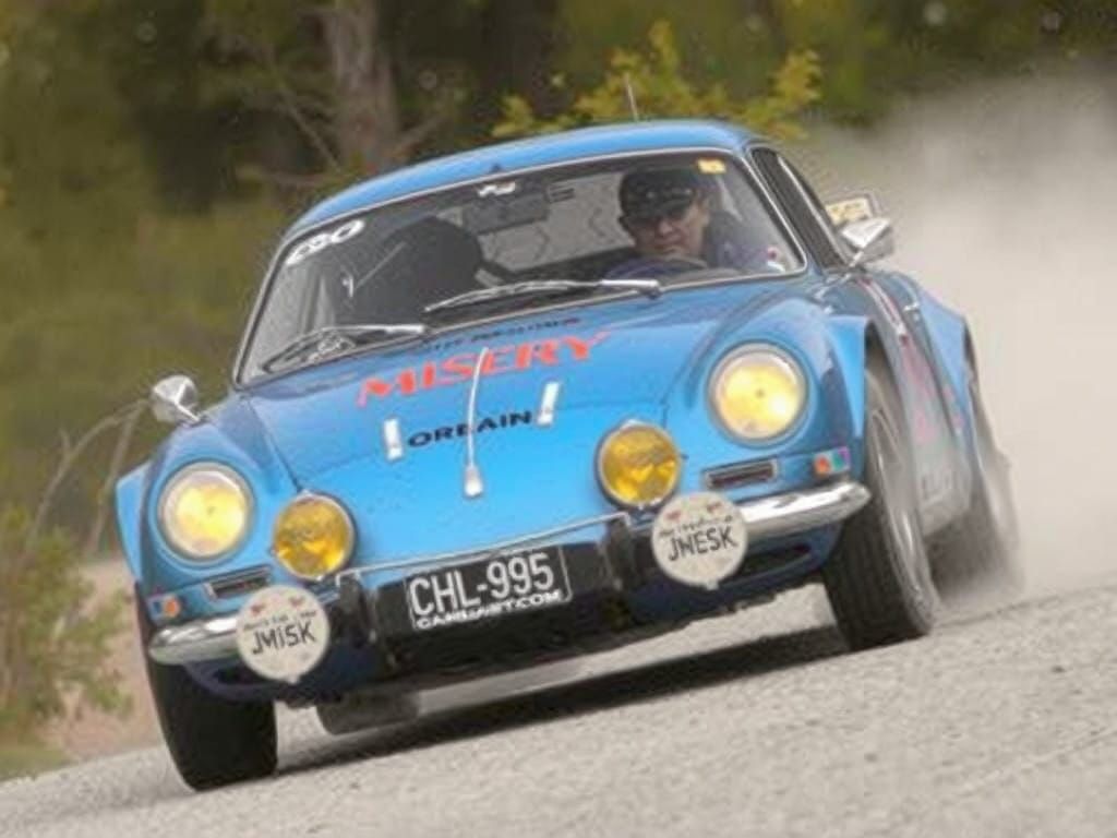 Rally car wrapped in "misery" artwork