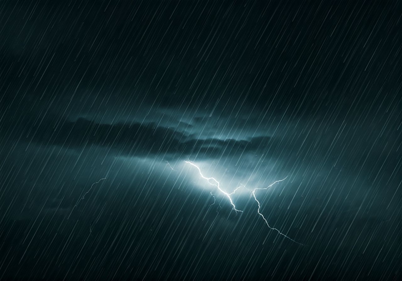Ominous Rainstorm Illuminated by Lightning