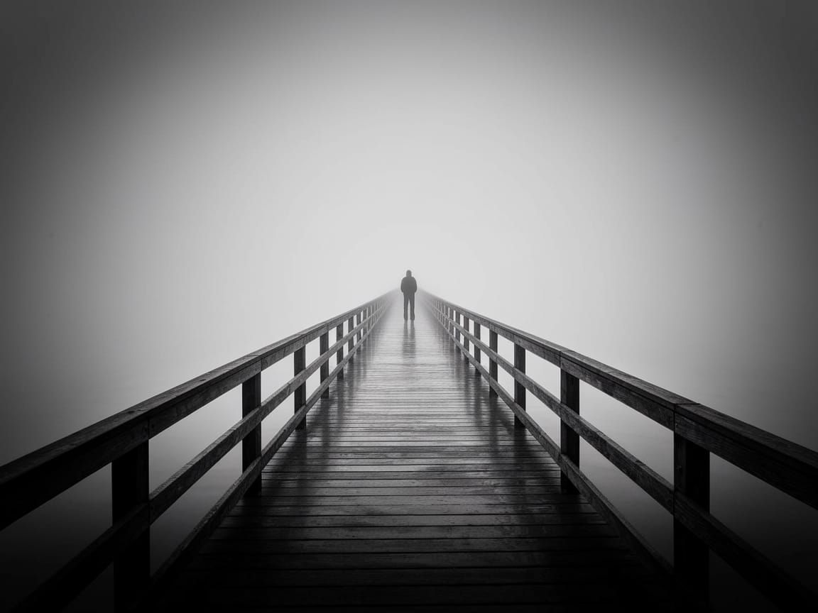 Ethereal Solitude on a Monochromatic Pier