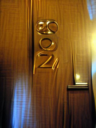Hotel Room Door. Number 307 on the Door. Entrance to Room 307.