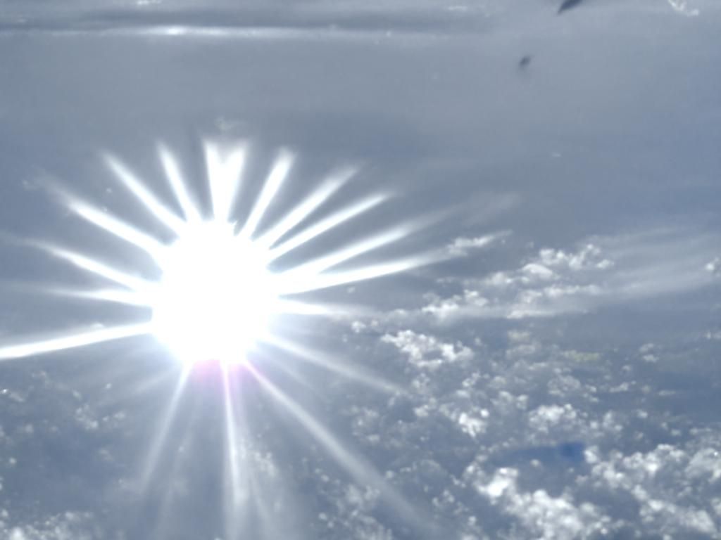 Radiant Sun Shining from Higher Plane