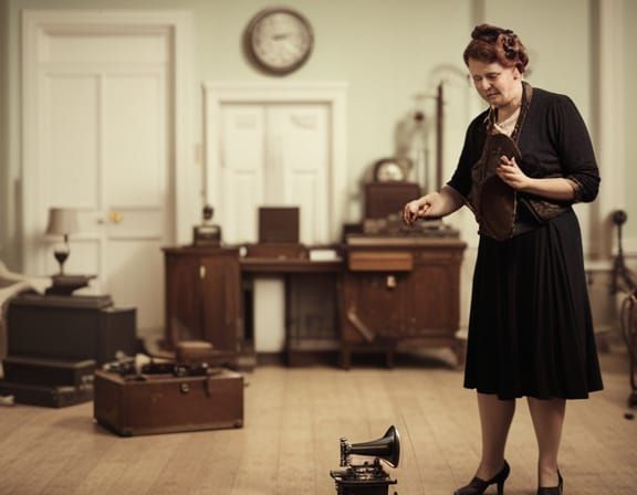 Woman with Gramophone in 1940s Style Room