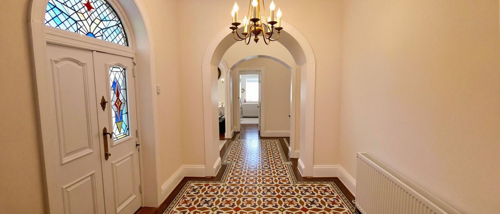 Elegantly Designed Hallway with Geometric Patterned Floor