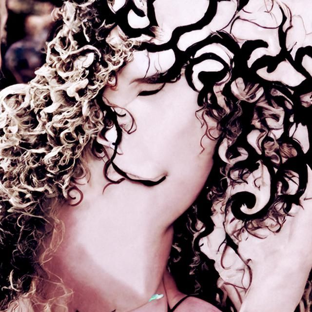 Enchanting Curly Haired Goddess