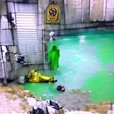 Hazmat Suit Figure Dissolving in Acid