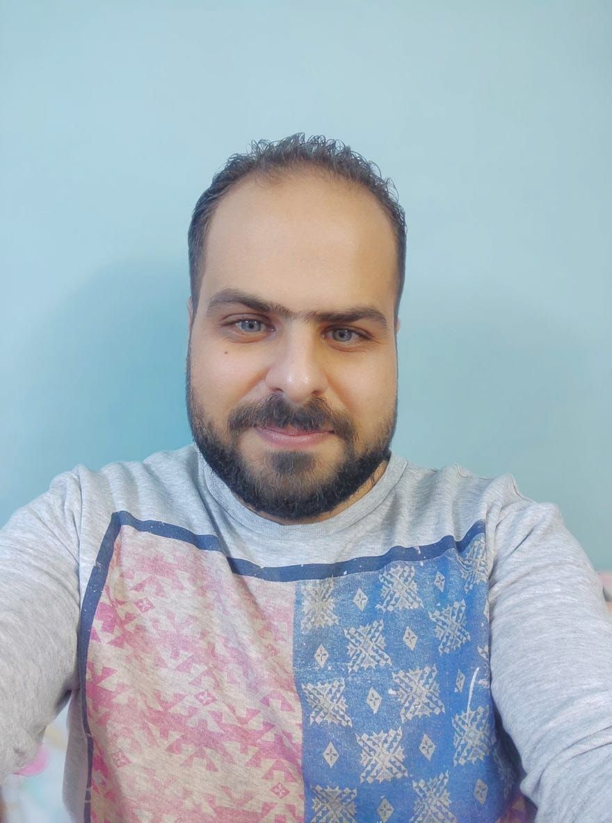 Person in Black Suit With Matching Background