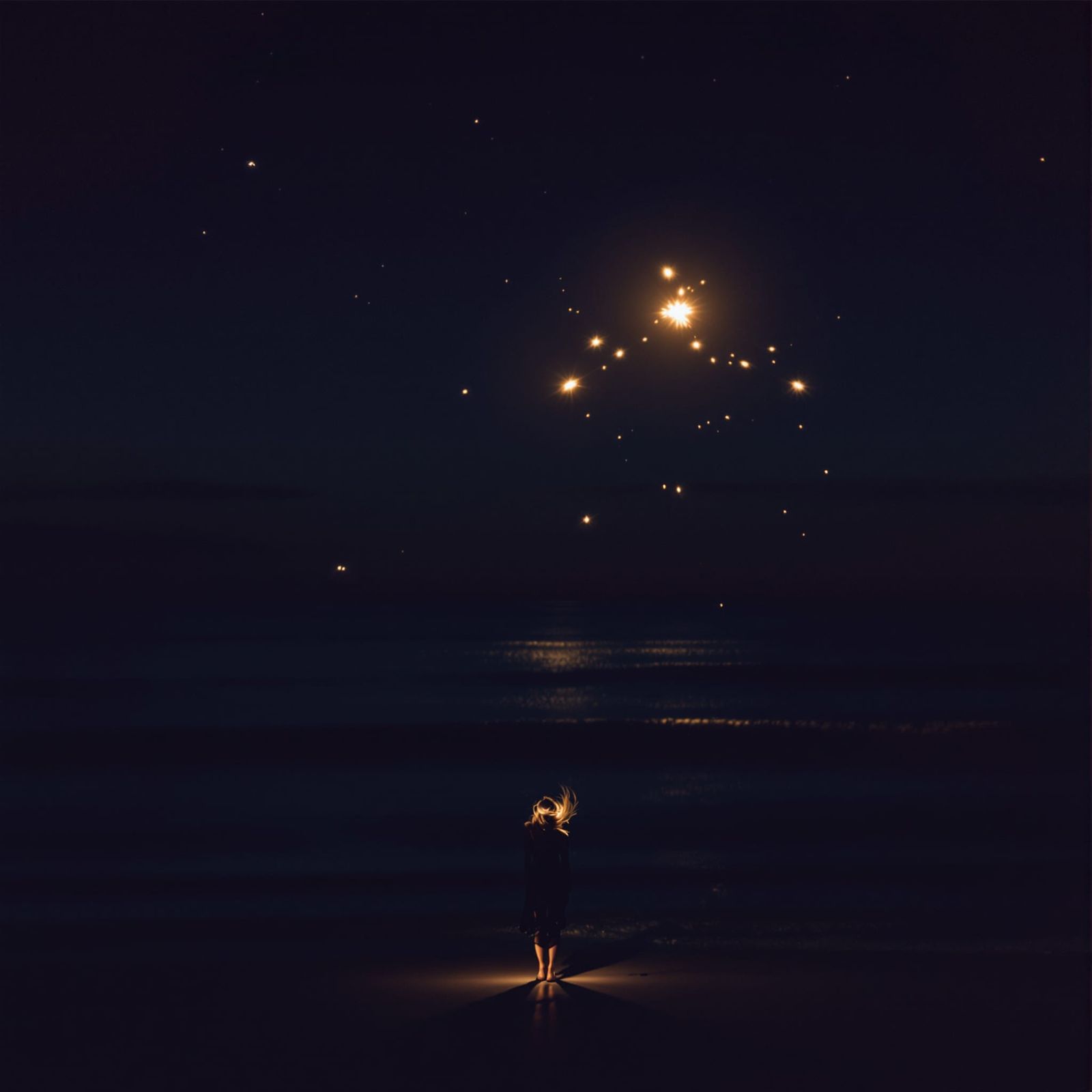 Woman Watches Last Firework Over Sea At Dusk